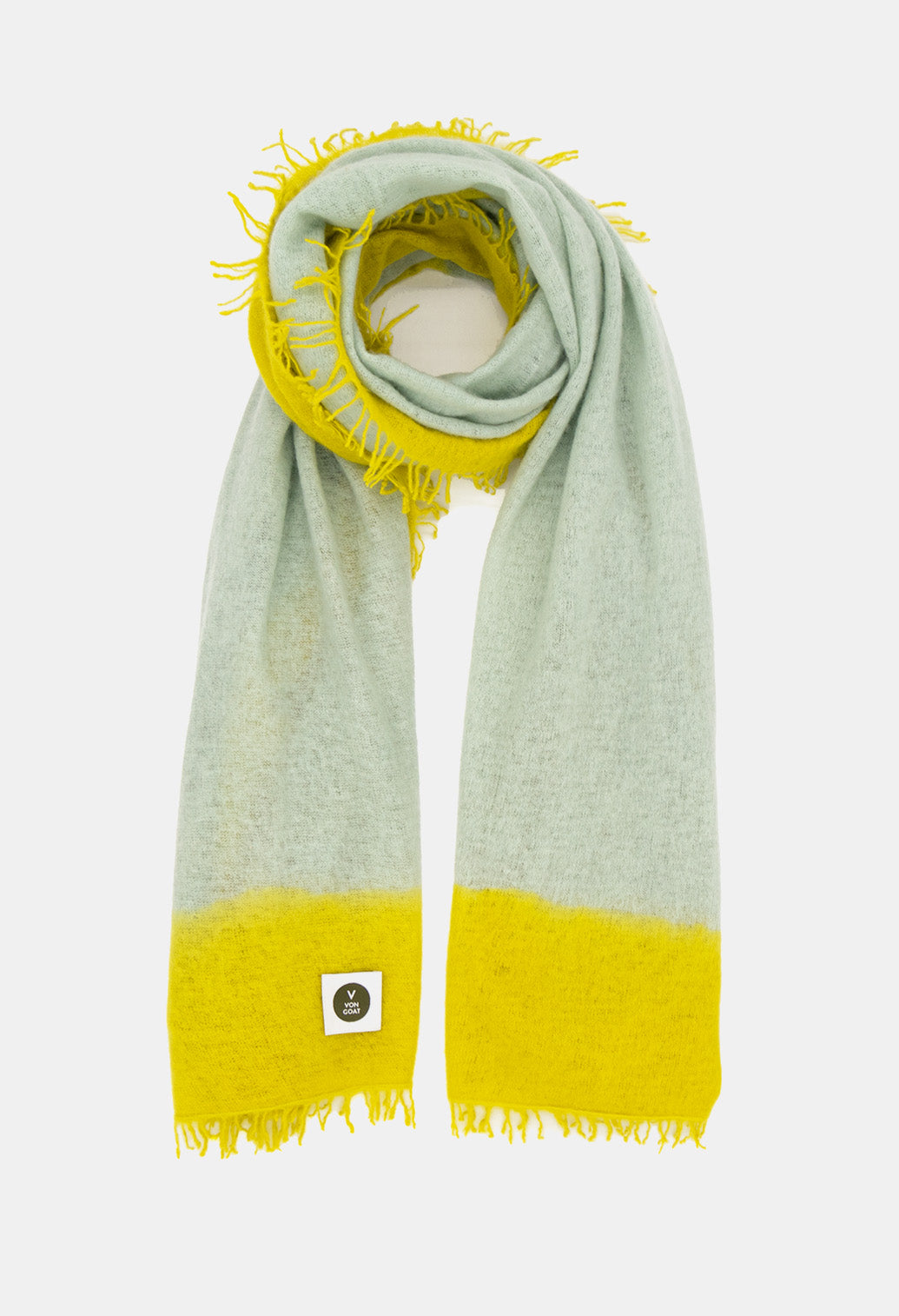 V Von Goat Kaschmir-Schal mit Fransen im Frame-Stil in den Farben Grau und Gelb aus reiner Cashmere-Wolle auf weißem Untergrund.