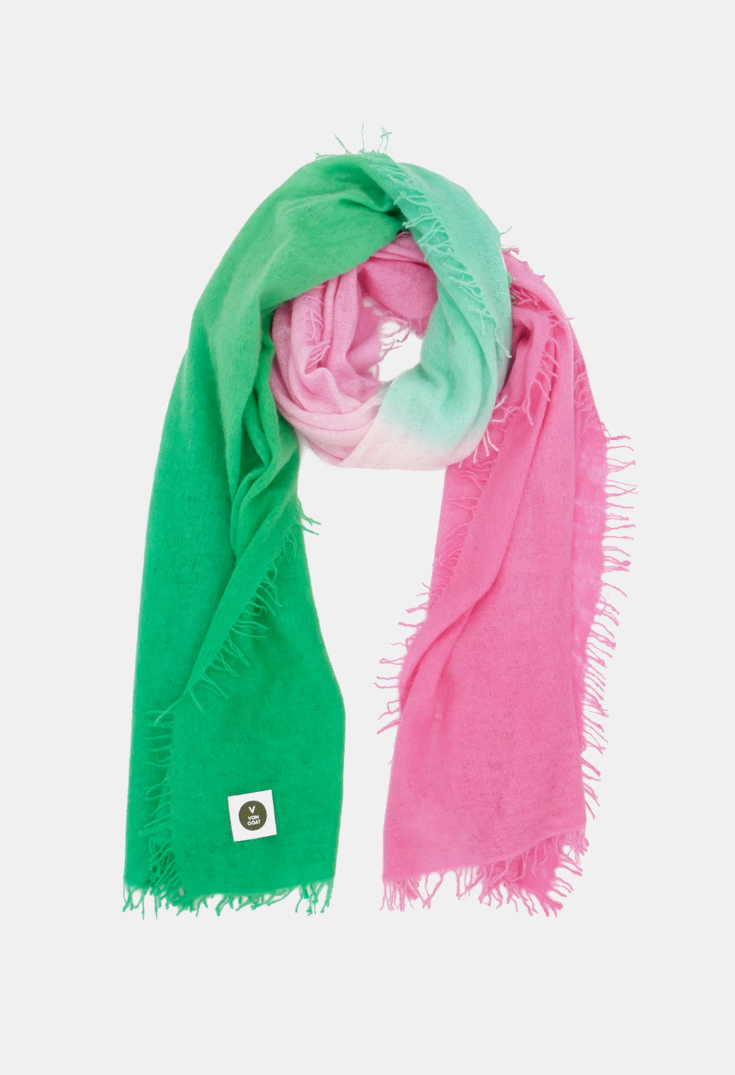 V Von Goat Kaschmir-Schal mit Fransen im Tiedye-Stil in den Farben Grün und Pink aus reiner Cashmere-Wolle auf weißem Untergrund.
