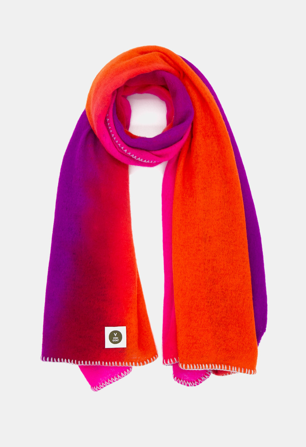 V Von Goat Kaschmir-Schal mit Fransen im Tiedye-Stil in den Farben Neon Pink und Neon Lila und Orange aus reiner Cashmere-Wolle auf weißem Untergrund.
