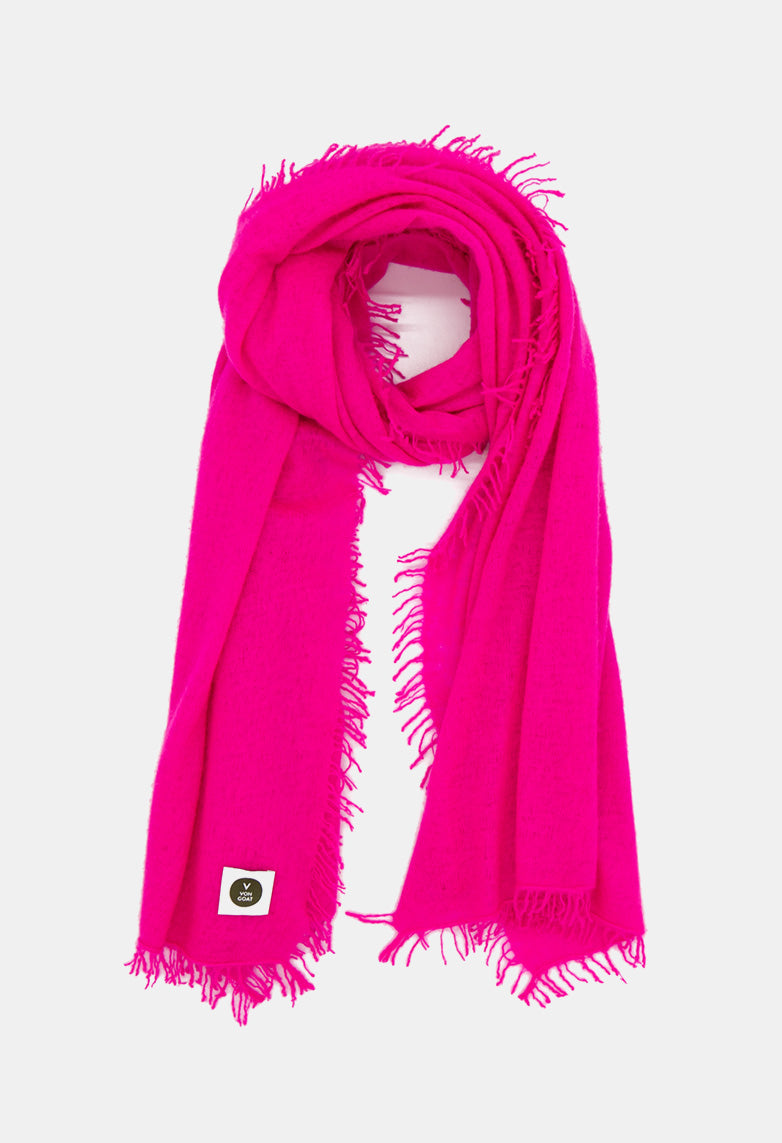 V Von Goat Kaschmir-Schal mit Fransen im Uni-Stil in den Farben Neon Pink aus reiner Cashmere-Wolle auf weißem Untergrund.